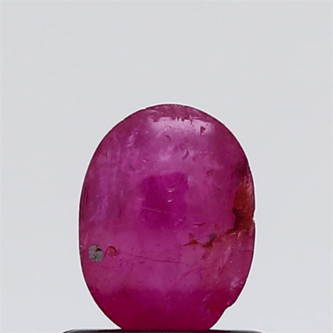 0.73 carat 1 ratti natural Africa Oval shape pinkish-red ruby gemstone.