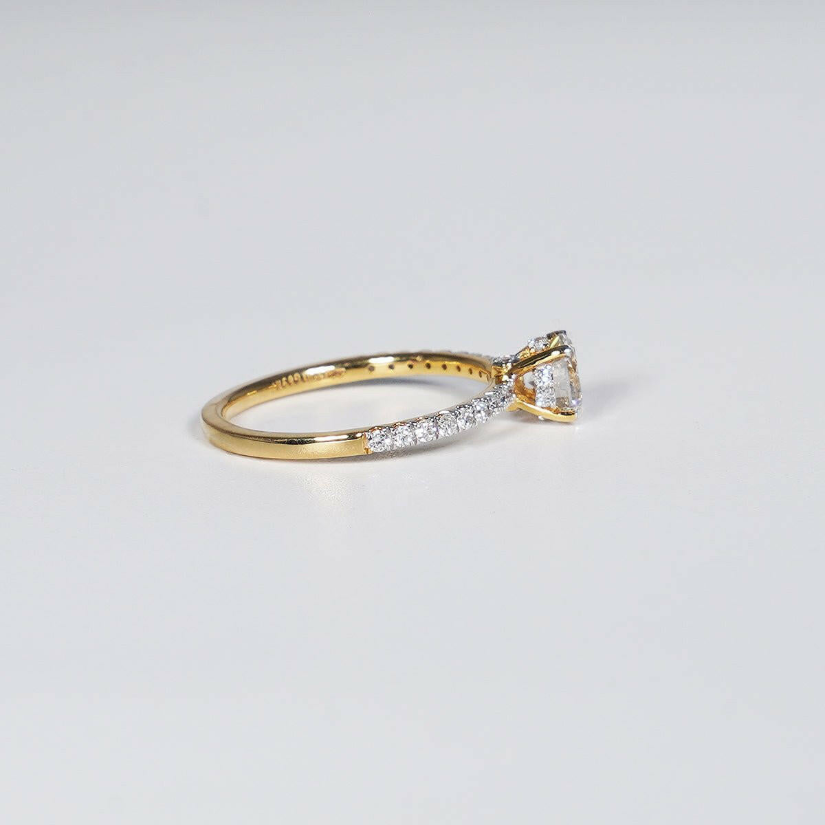 0.73 Carat Brilliant Round Cut Lab Grown Diamond Ring in 18K Yellow Gold.
