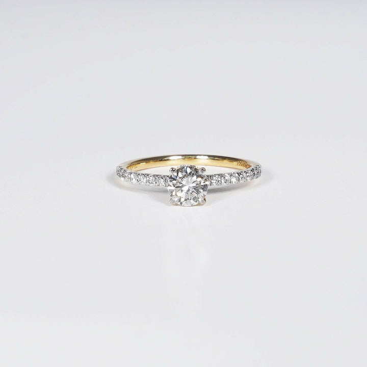 0.73 Carat Brilliant Round Cut Lab Grown Diamond Ring in 18K Yellow Gold.