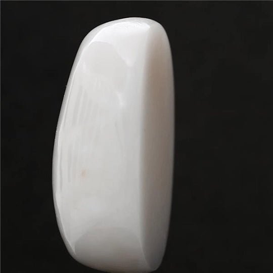 12.8 carat 14.25 ratti natural Japanese oval shape white coral stone.