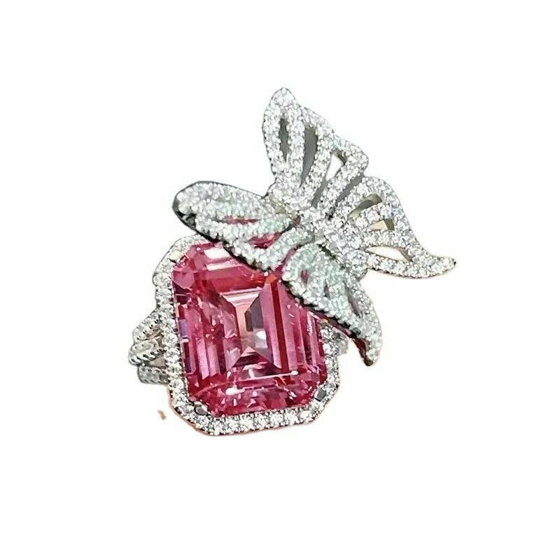 14 k gold studded 4 carat vivid pink emerald shape diamond ring.