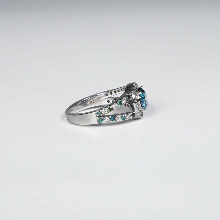 1.46 Carat Vivid Blue Round Cut Lab Grown Diamond Ring in 14K White Gold.