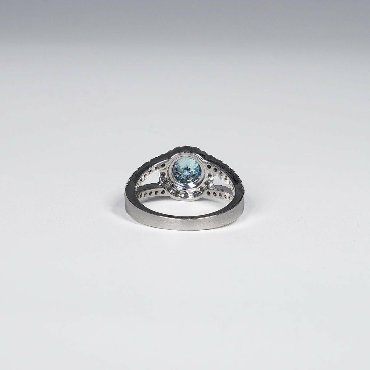 1.46 Carat Vivid Blue Round Cut Lab Grown Diamond Ring in 14K White Gold.