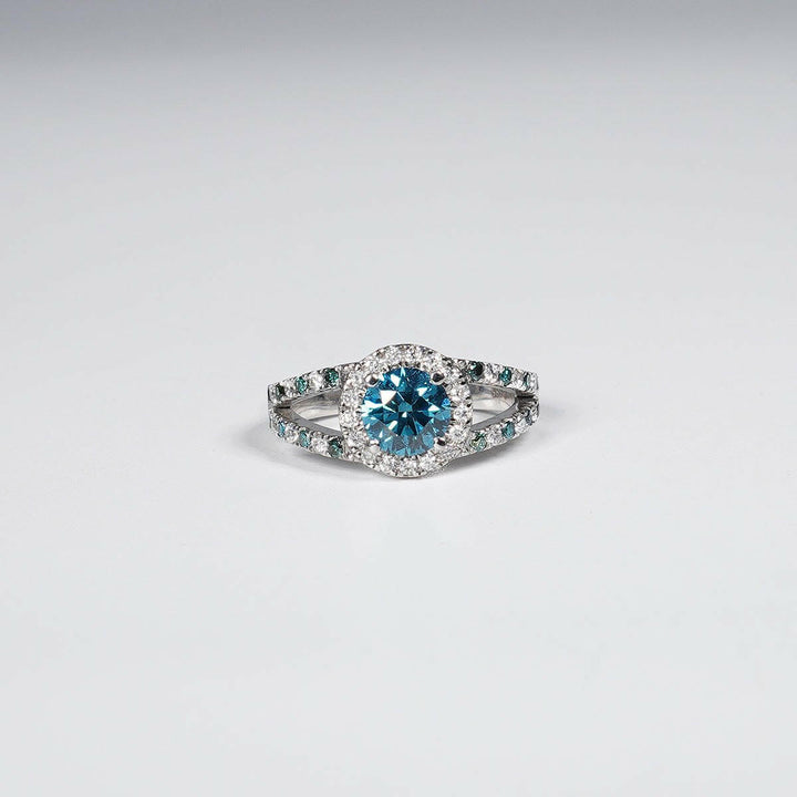 1.46 Carat Vivid Blue Round Cut Lab Grown Diamond Ring in 14K White Gold.