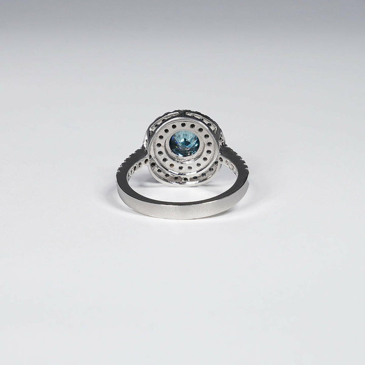 1.49 Carat Round Shape Vivid Blue Lab Grown Diamond Ring in 14K White Gold.