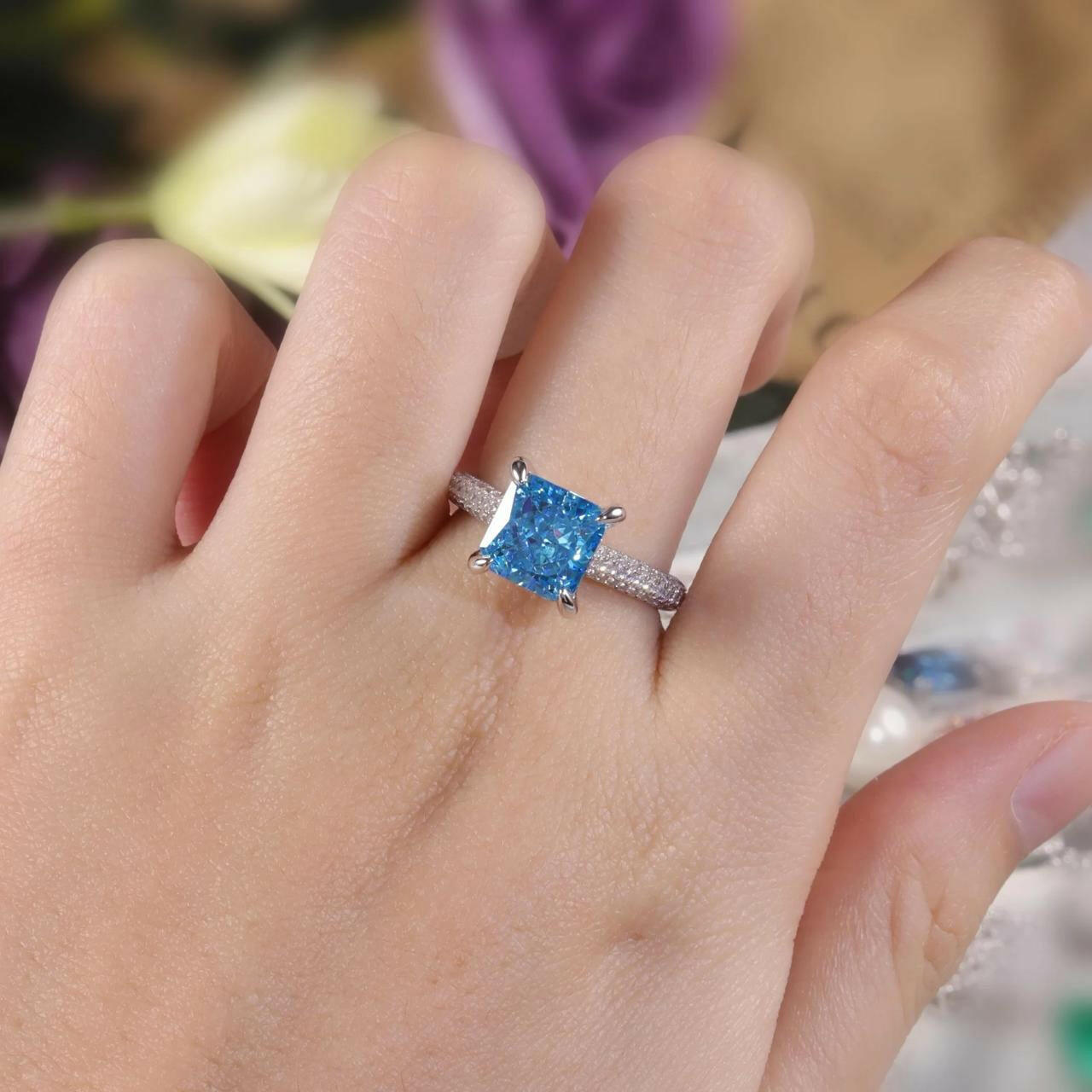 14k gold studded vivid blue square Radiant shape Diamond studded ring.