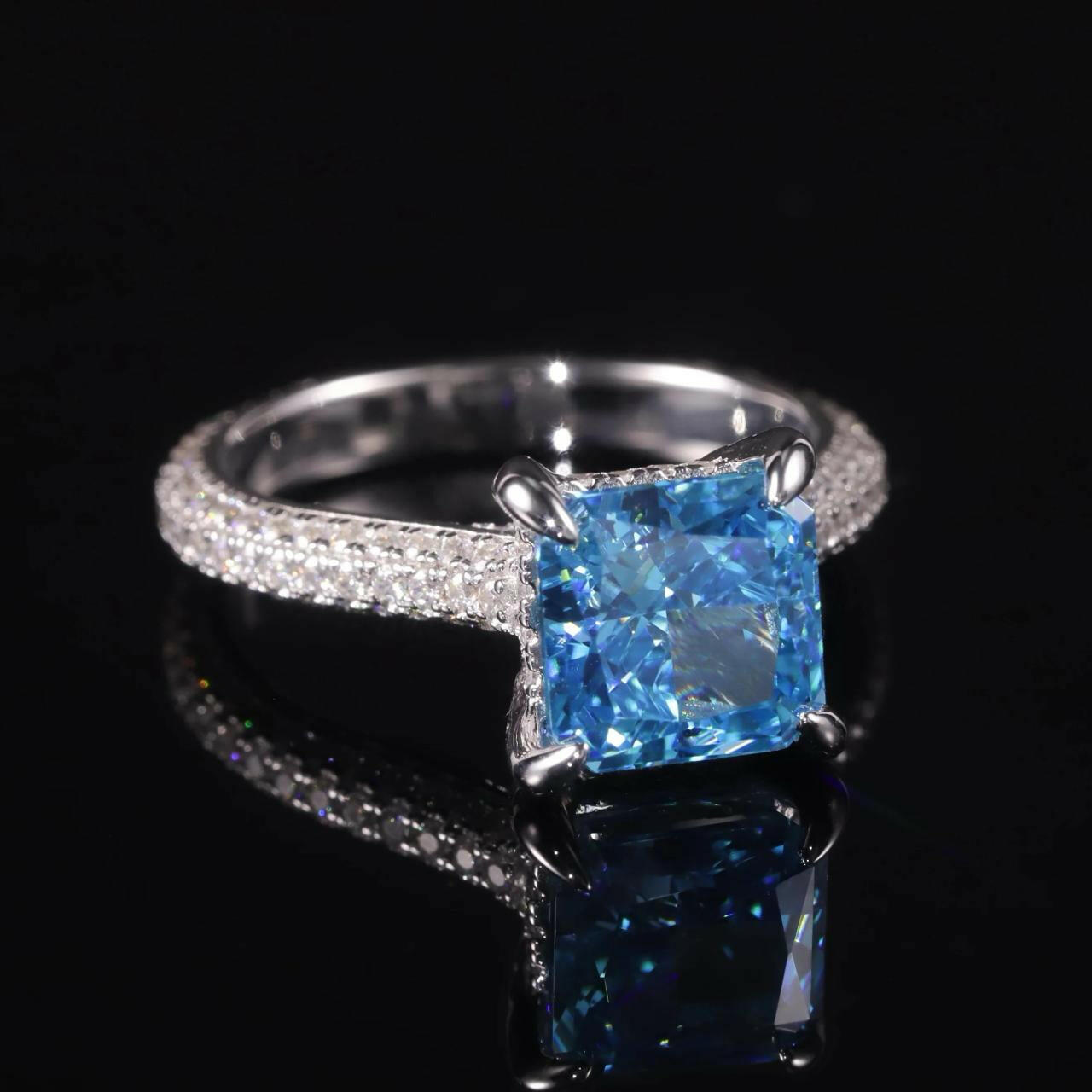14k gold studded vivid blue square Radiant shape Diamond studded ring.