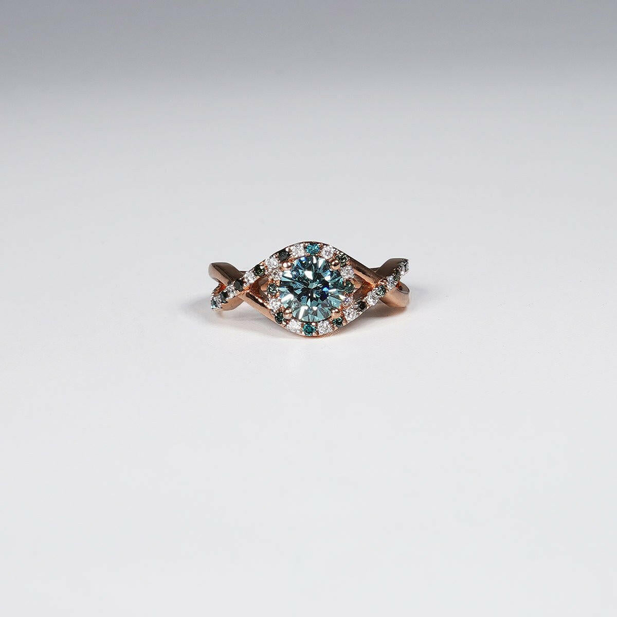 14K Rose Gold with 1.32 Carat Vivid Blue Round Cut Lab Grown Diamond Ring.