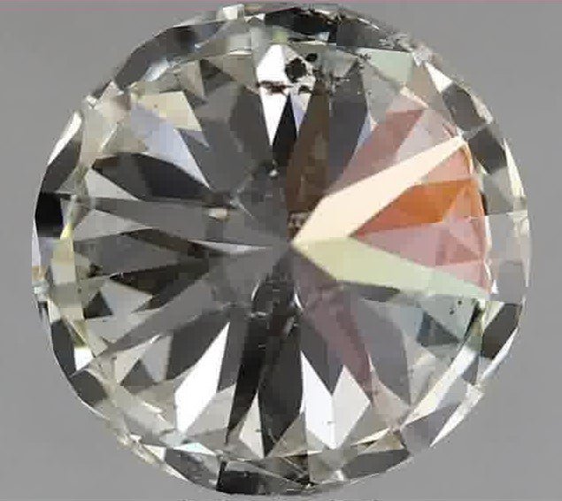 1.50ct Round Brilliant Cut J Clarity S12 Color Natural Diamond.