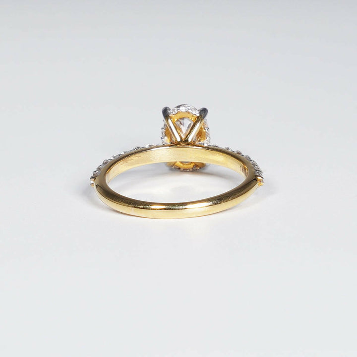 1.56ct Oval Elegance with Brilliant Round Lab Grown Diamond Ring in 14K Yellow Gold.