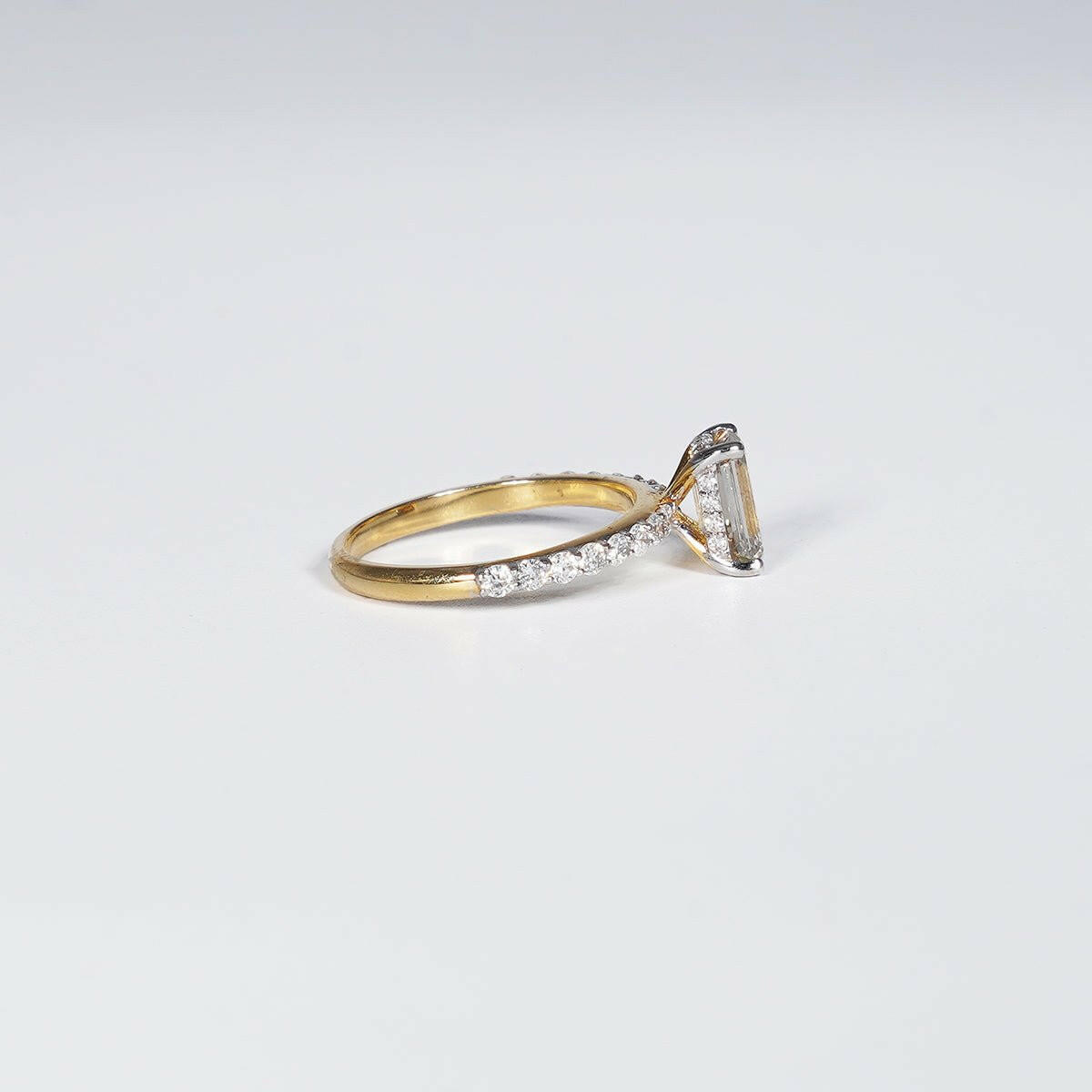 1.70 Carat Emerald Shape Lab Grown Diamond Ring in 14K Yellow Gold.