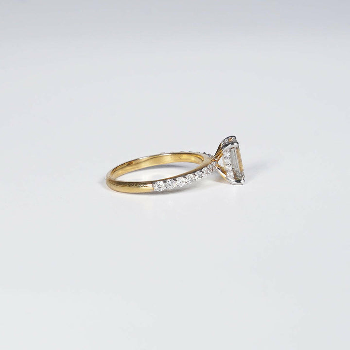1.70 Carat Emerald Shape Lab Grown Diamond Ring in 14K Yellow Gold.