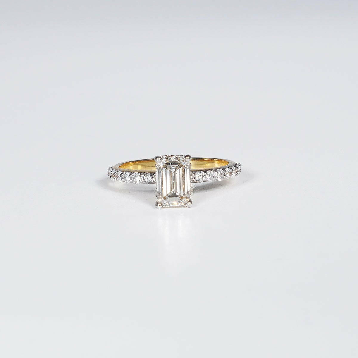 1.70 Carat Emerald Shape Lab Grown Diamond Ring in 14K Yellow Gold.