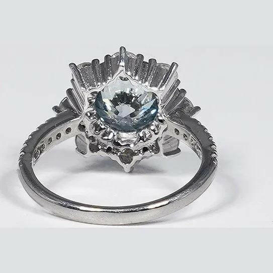 3.30 Carat Vivid Blue Round Cut Lab Grown Diamond Ring in 14K White Gold.