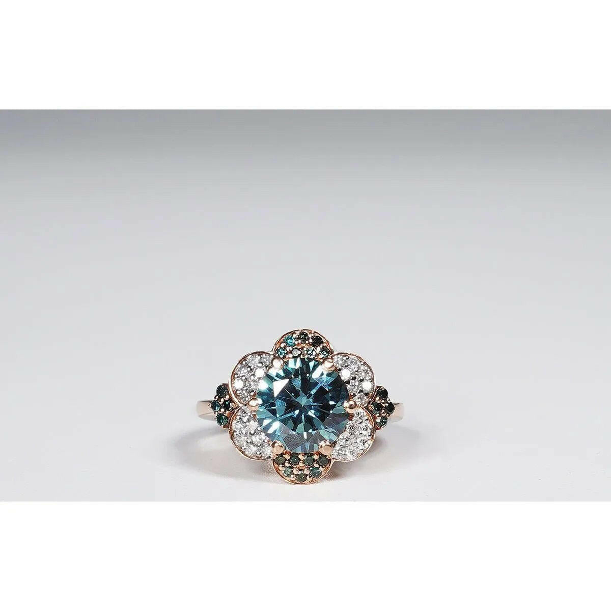 3.34 Carat Vivid Blue Round Cut Lab Grown Diamond Ring in 14K Rose Gold.