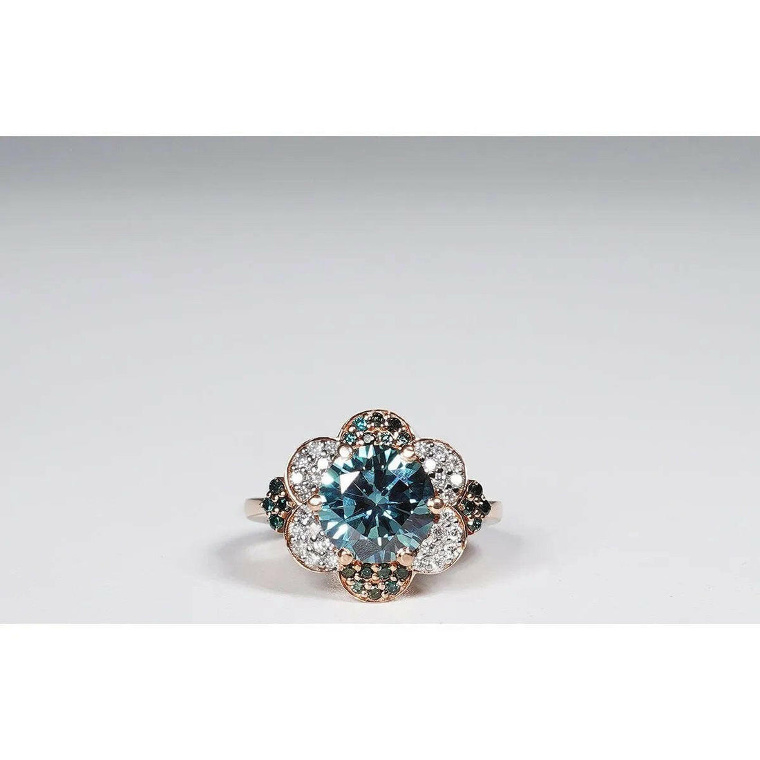 3.34 Carat Vivid Blue Round Cut Lab Grown Diamond Ring in 14K Rose Gold.