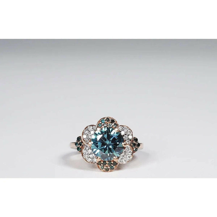 3.34 Carat Vivid Blue Round Cut Lab Grown Diamond Ring in 14K Rose Gold.