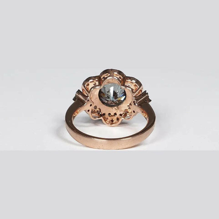 3.34 Carat Vivid Blue Round Cut Lab Grown Diamond Ring in 14K Rose Gold.