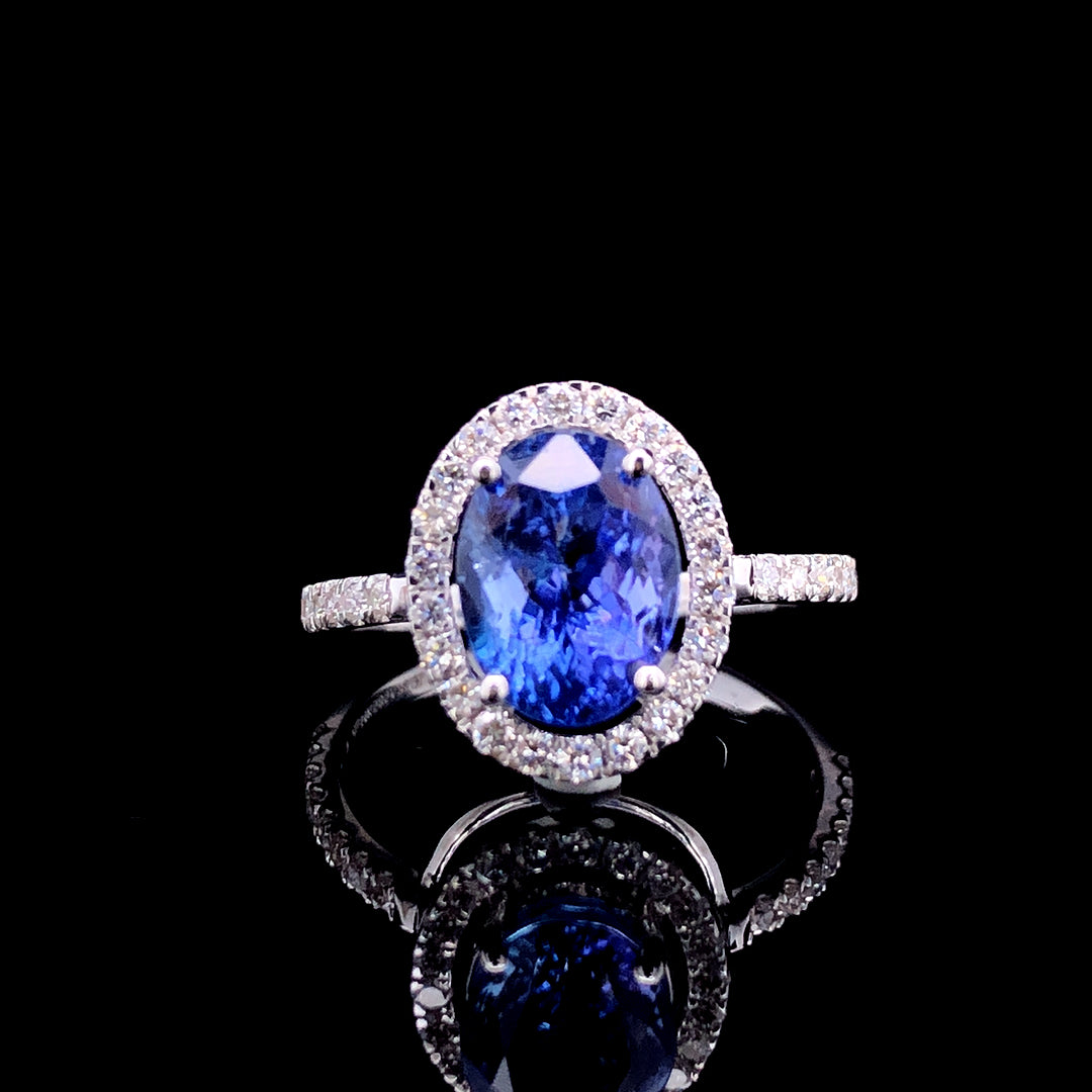 2.31ct Tanzanite Stone And 0.37ct Lab-Grown Diamond Oval Ring In 14k White Gold.