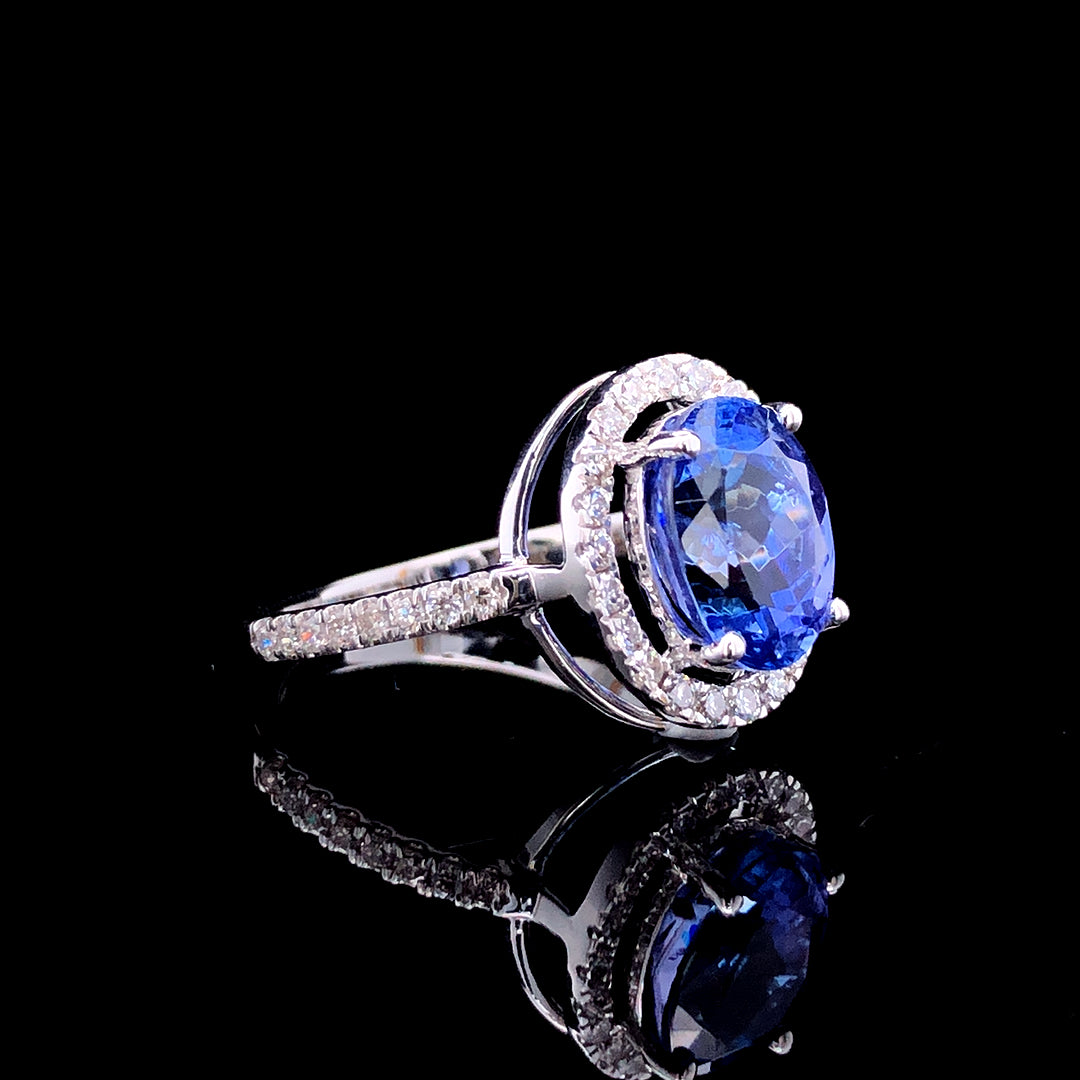 2.31ct Tanzanite Stone And 0.37ct Lab-Grown Diamond Oval Ring In 14k White Gold.