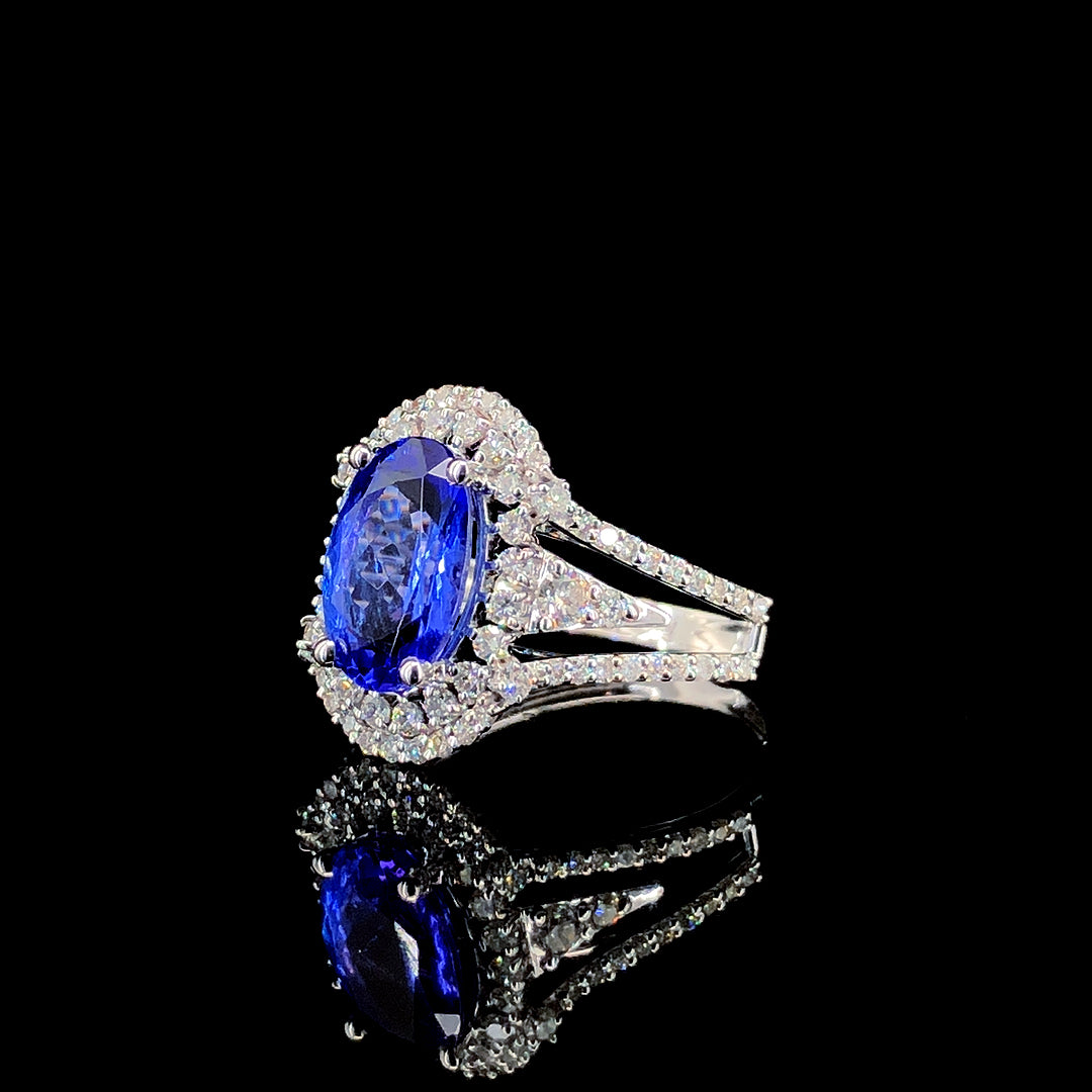 2.25ct Tanzanite Stone And 0.683ct Lab-Grown Diamond Oval Ring In 14k White Gold.