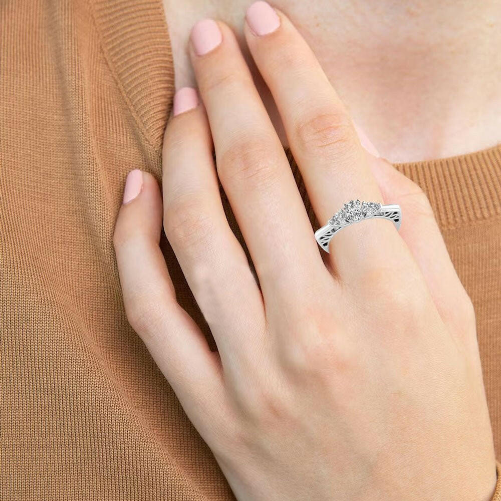 A Match Made in Heaven White Gold Ring with 0.80ct Oval & Pear Diamonds.