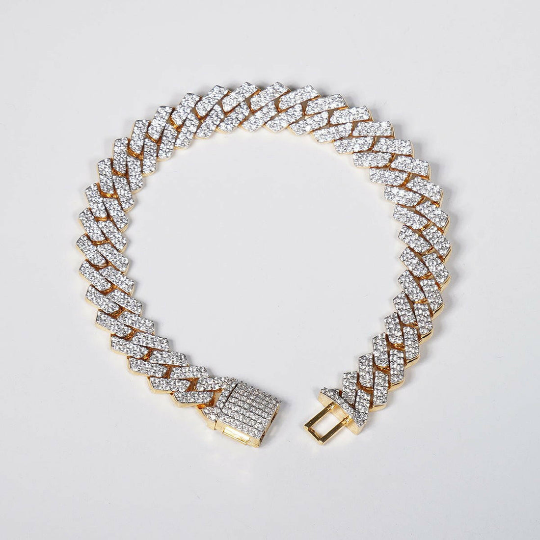 Make a Statement with Our 6.69ct Lab Grown Diamond Cuban Bracelet in 18K Yellow Gold.