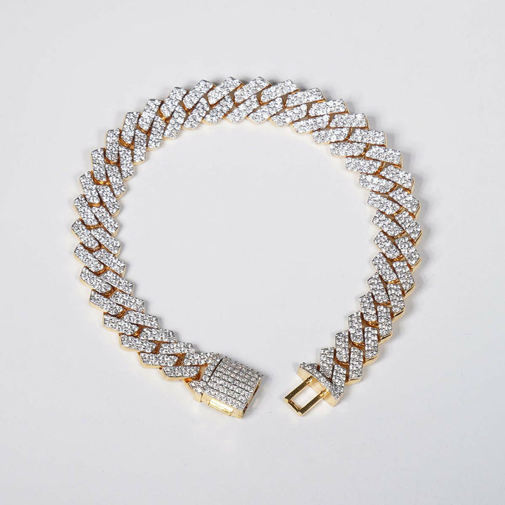 Make a Statement with Our 6.69ct Lab Grown Diamond Cuban Bracelet in 18K Yellow Gold.
