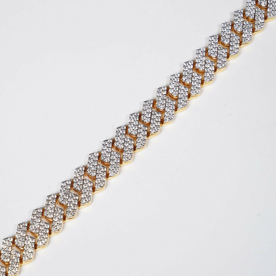 Make a Statement with Our 6.69ct Lab Grown Diamond Cuban Bracelet in 18K Yellow Gold.