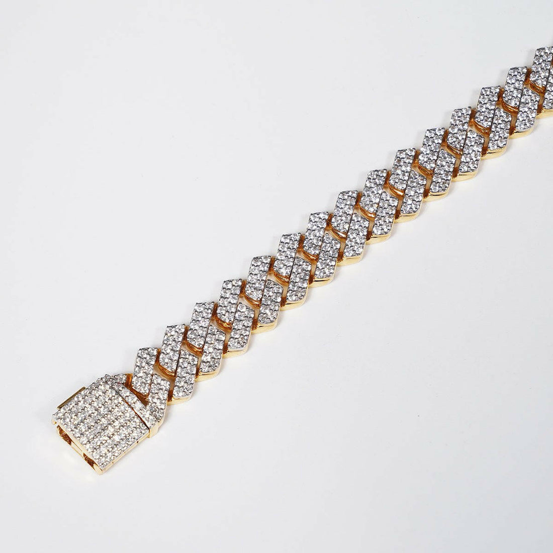 Make a Statement with Our 6.69ct Lab Grown Diamond Cuban Bracelet in 18K Yellow Gold.