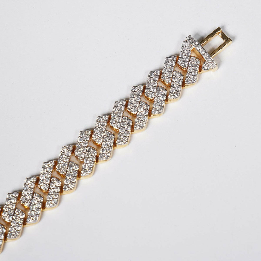 Make a Statement with Our 6.69ct Lab Grown Diamond Cuban Bracelet in 18K Yellow Gold.